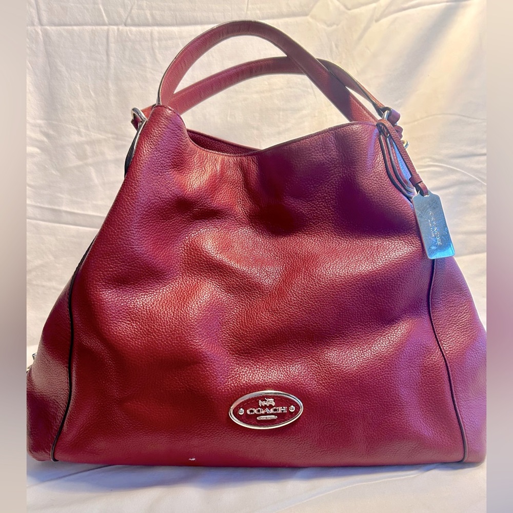 Coach red large leather bag.